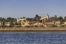 Oil Pares Weekly Drop as Wildfire Disruptions Battle Oversupply